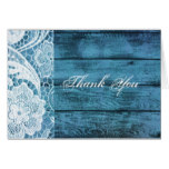 white lace on blue barn board background card